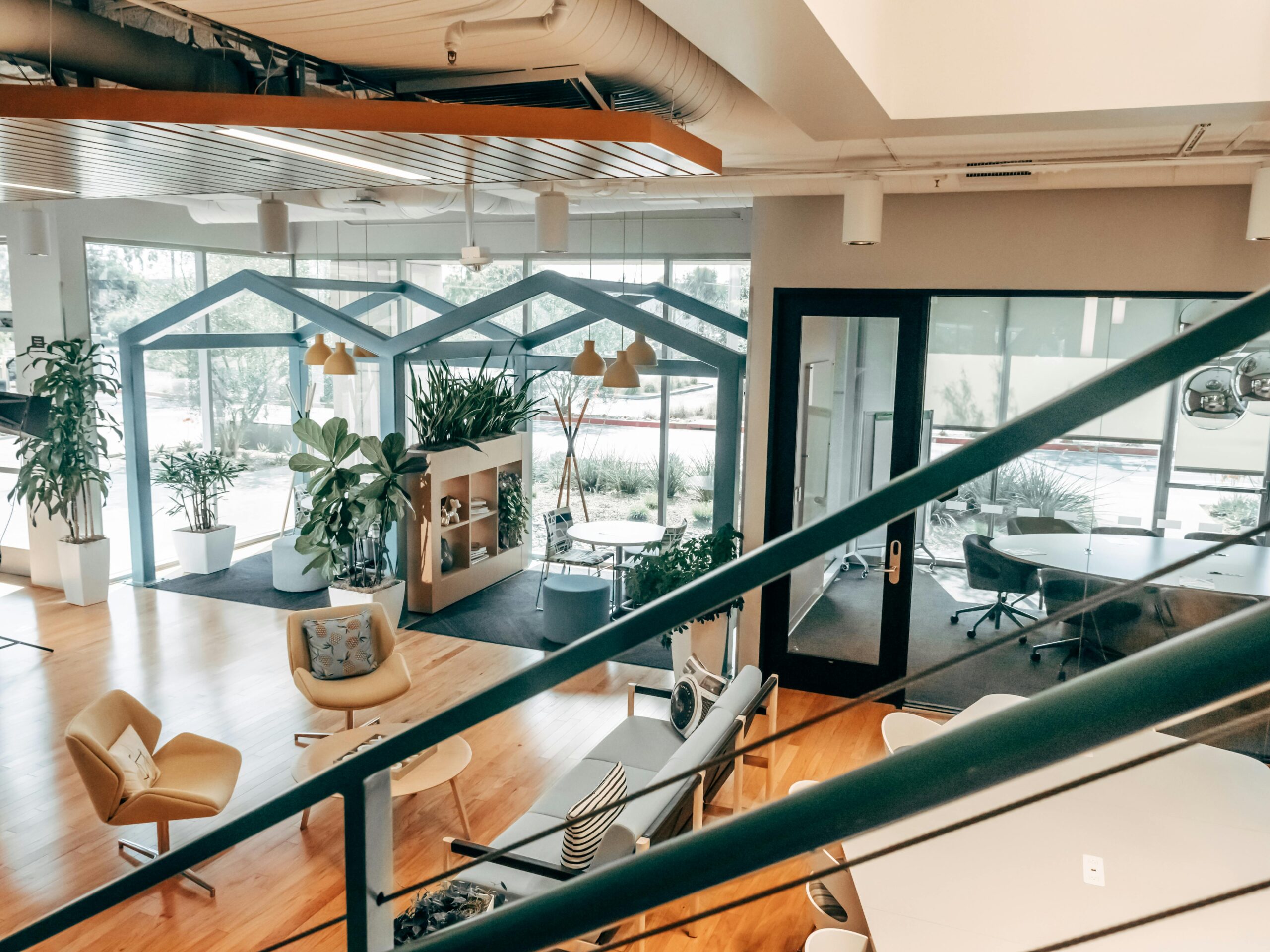 Stairs down to a communal workspace